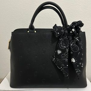 Betsy Johnson viral skull satchel bag